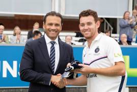 HIGGINS AND HOLDEN RECEIVE THEIR COUNTY CAPS