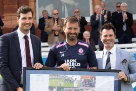 TIM MURTAGH PRESENTED WITH CAREER MONTAGE DURING LUNCH INTERVAL TODAY 